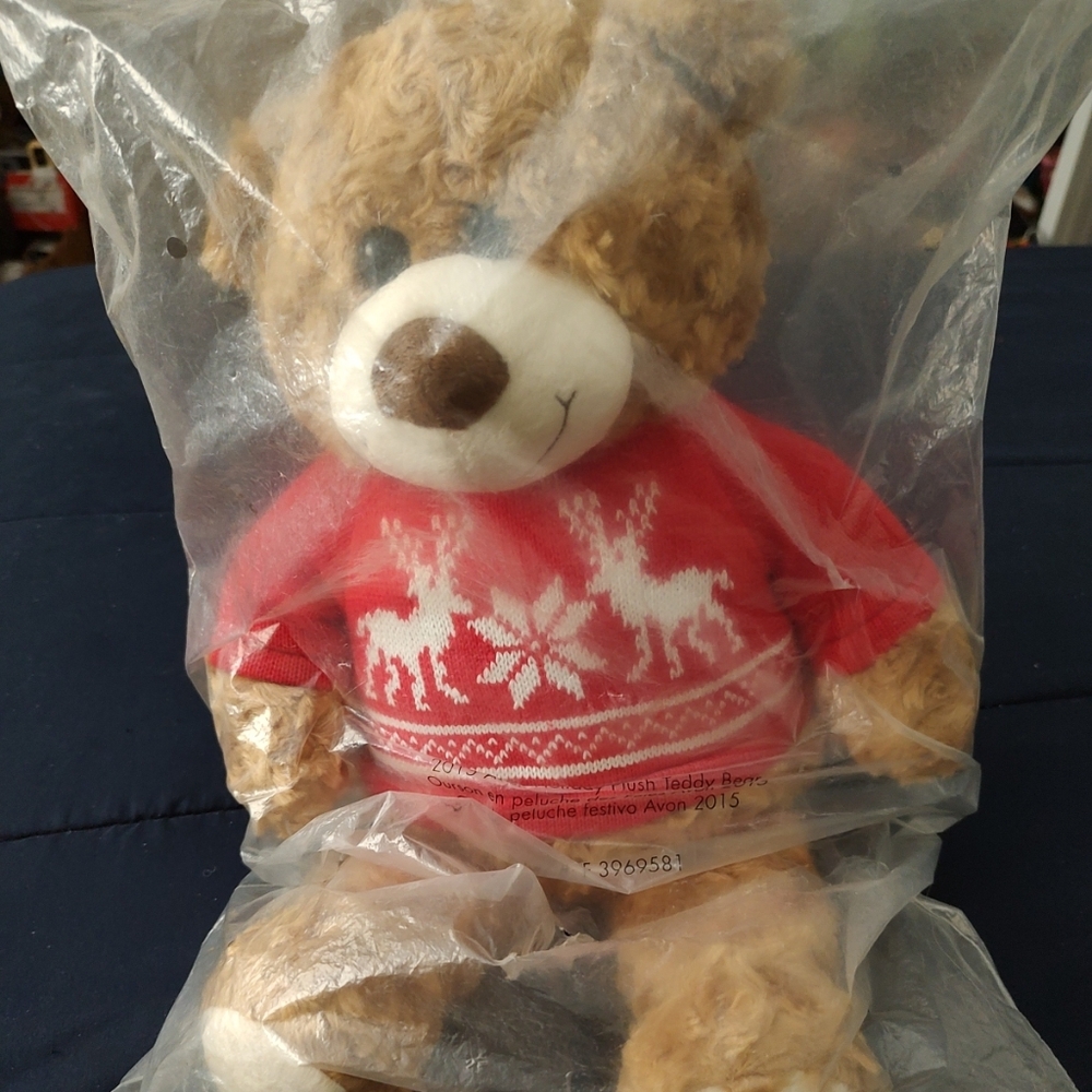 retired Avon adorable brown teddy bear wearing a red knitted long sleeve sweater